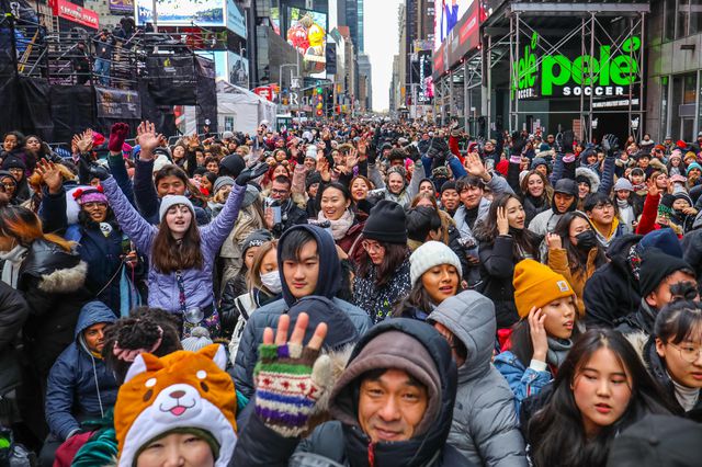 Revelers and police officers pack Times Square on December 31, 2019
